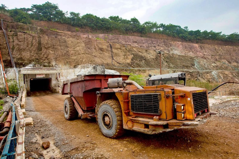 A truck leaves the Chibuluma copper mine after collecting ore from 1,693 feet (516 meters) below the surface in the Zambian copper belt region, Jan. 17, 2015. (Reuters)