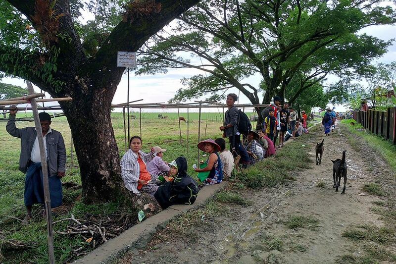 Displaced people rest as fighting renewed between Myanmar's junta and the Arakan fighters in Pauktaw Township in Rakhine state on Nov. 19, 2023. The Arakan Army ended the cease-fire in Rakhine state and have taken major junta bases. (AFP photo)