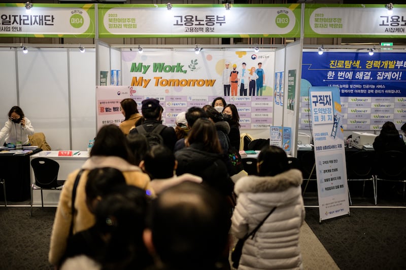 People lining up at a job fair for North Korean defectors in Seoul on Dec. 1, 2023.