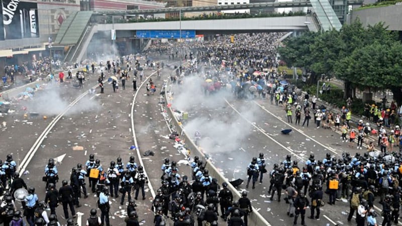 Police fire tear gas at protesters in Hong Kong's Admiralty District, June 12, 2019.