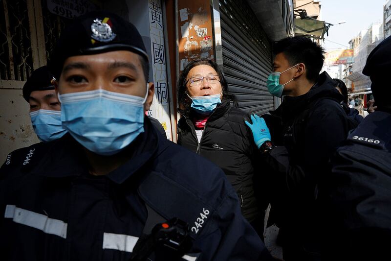 2021年1月14日，香港九龙城区议员黄国桐被警方逮捕。（路透社）