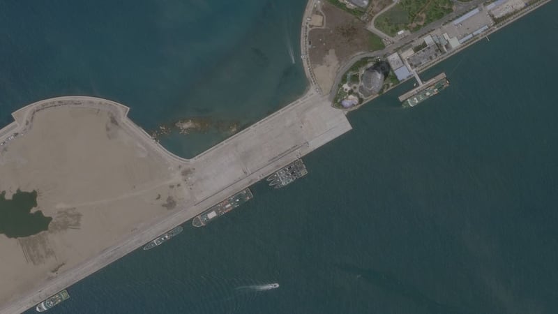 Chinese ships in port at Sanya, April 3, 2020. The ship in the lower left of the harbor is the Hai Yang Di Zhi 8, the survey vessel currently carrying out operations within Malaysia's waters. 