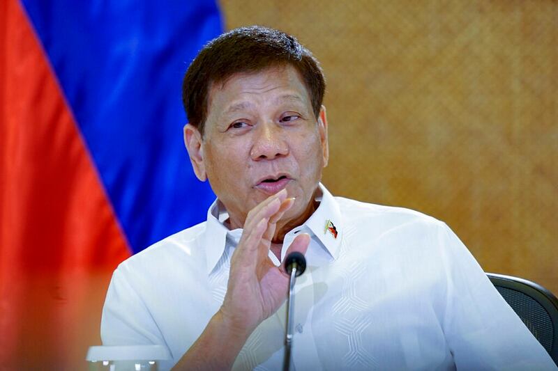 Philippine President Rodrigo Duterte gestures as he meets cabinet officials at the Malacanang presidential palace in Manila, Philippines, March 7, 2022. Credit: Malacanang Presidential Photographers Division via AP