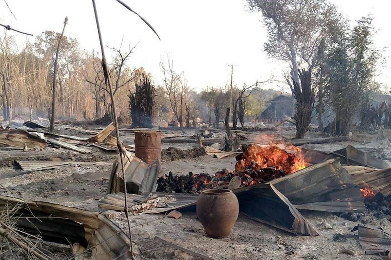 U Gin village in Myanmar's Rakhine state burns after a junta attack on March 6, 2025.