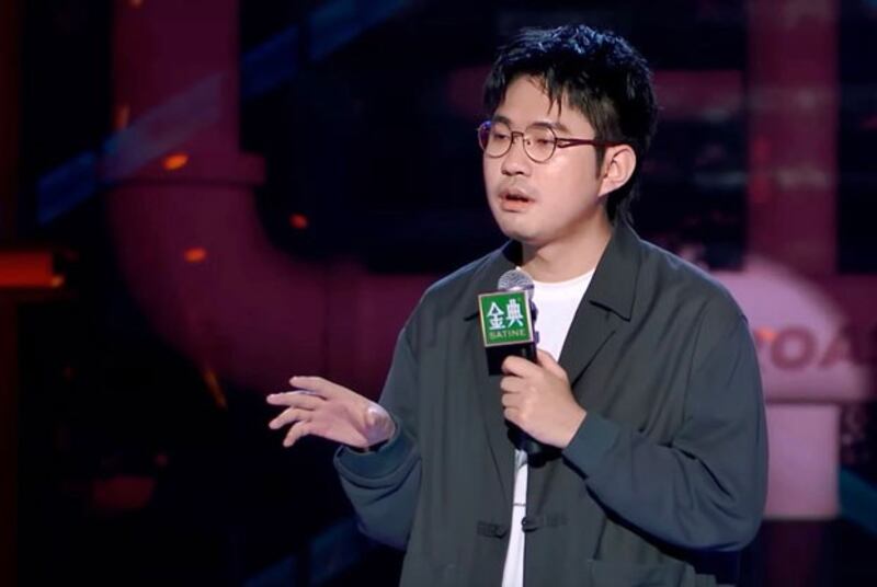 In this undated screen shot, stand-up comic Li Haoshi performs onstage. His employer, a Chinese comedy agency, suspended Li after he sparked public ire with a joke which some said likened feral dogs to soldiers of the People's Liberation Army. (Screen shot from Tencent Video Talk show)