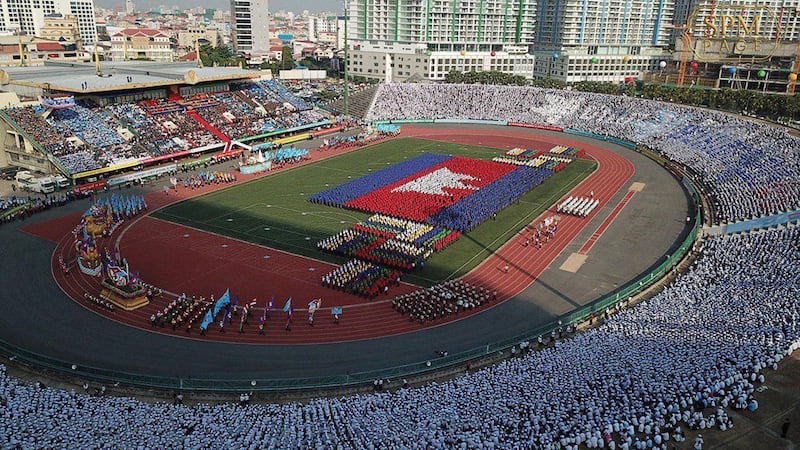 Marchers parade through Phnom Penh's Olympic Stadium at an event marking the 40th anniversary of the end of the Khmer Rouge era in Phnom Penh, Jan. 7, 2019. Credit: Hun Sen's Facebook page