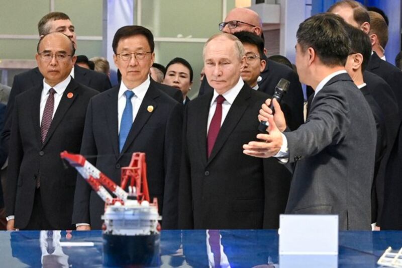 Russian President Vladimir Putin (2nd R) and Chinese Vice President Han Zheng (2nd L) visit the Russian-Chinese Expo in Harbin, northeastern China's Heilongjiang province, May 17, 2024. (Sergei Bobylev/Sputnik/Kremlin Pool Photo via AP)