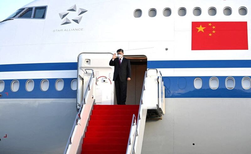 Chinese President Xi Jinping waves as he boards a plane after his visit to Kazakhstan, in Nur-Sultan, Kazakhstan, Sept. 14, 2022. Credit: Press service of the President of Kazakhstan/Handout via Reuters