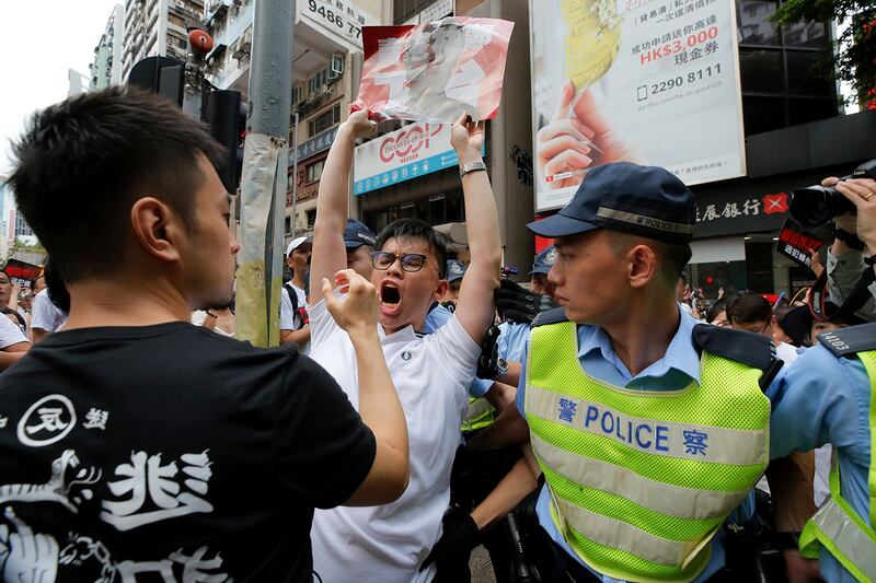 香港百万人参与的反“送中”大游行抗议现场。（美联社）