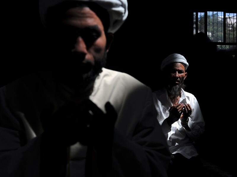 Muslims pray at a mosque in Aksu, Xinjiang Uyghur Autonomous Region August 3, 2012.