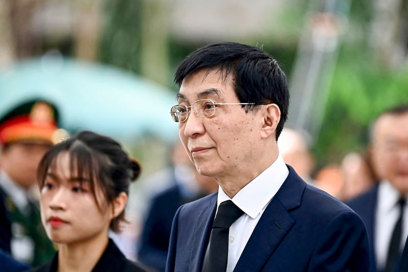 Chairman of the Chinese People's Political Consultative Conference Wang Huning pays his respect for the late General Secretary of the Communist Party of Vietnam Nguyen Phu Trong at the national funeral house during the first day of a two-day-national mourning in Hanoi on July 25, 2024. (Nhac Nguyen/Pool/AFP)