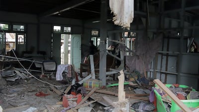 A destroyed building in Demawso township. PDF