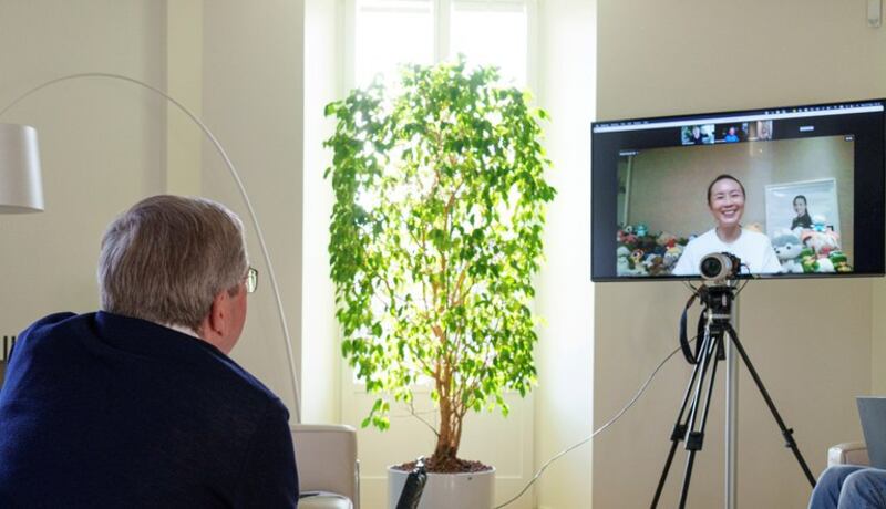 International Olympic Committee (IOC) President Thomas Bach has a virtual discussion with Chinese tennis player Peng Shuai in Lausanne, Switzerland, November 21, 2021. Credit: Greg Martin/IOC/ Handout via Reuters