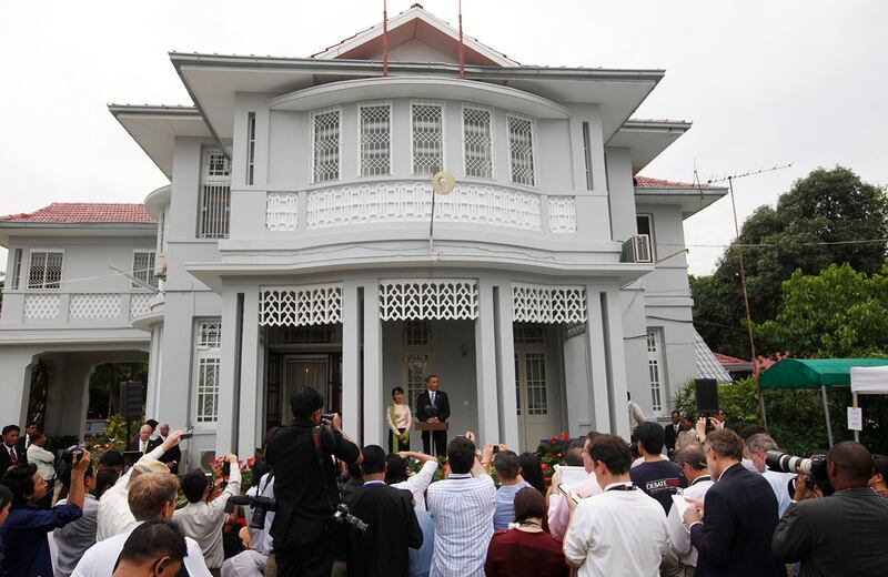 President Barack Obama, center right, and Myanmar State Counsellor Aung San Suu Kyi, center left, address members of the media at her residence in Yangon on Nov. 19, 2012. (Carolyn Kaster/AP)