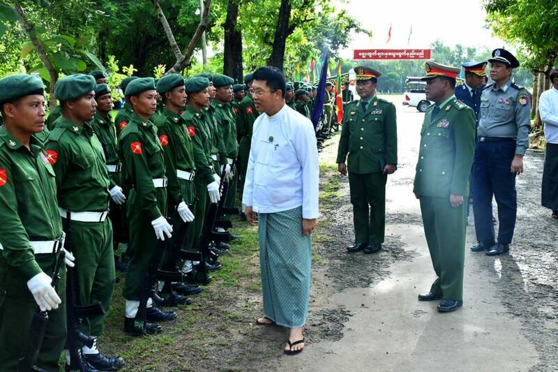 The junta's Chief Minister of the Ayeyarwady region, Tin Maung Win, center, inspects new recruits in Pathein, on June 29, 2024. (Myanmar Ministry of Information)