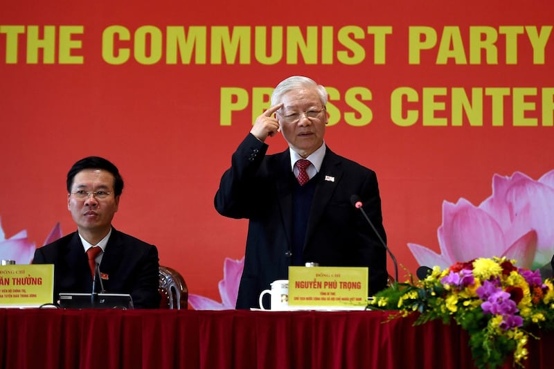 Vietnam's Communist Party general secretary Nguyen Phu Trong gestures next to now-President Vo Van Thuong at a press conference after the closing ceremony of the Communist Party of Vietnam (CPV) 13th National Congress at the National Convention Centre in Hanoi, Feb. 1, 2021. Credit: AFP