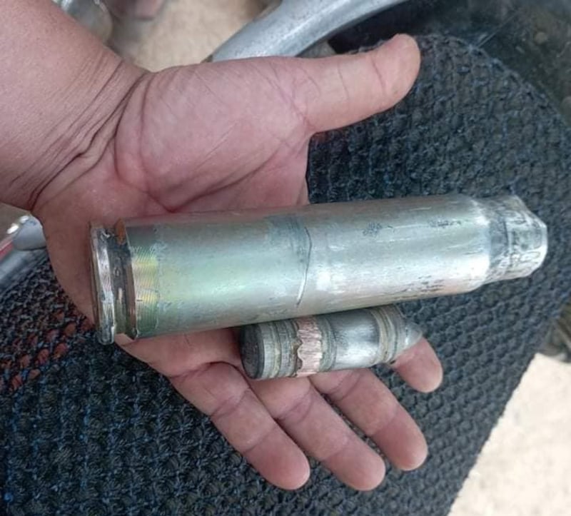 A spent cartridge and round found after the first attack at Pa Zi Gyi village in Sagaing's Kanbalu township, Myanmar, April 11, 2023. Credit: Citizen journalist