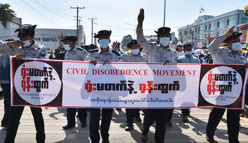 In this image grab from Feb. 2021 video, Myanmar government employees participate in the Civil Disobedience Movement protest against military junta. Credit: Image grab from RFA Video