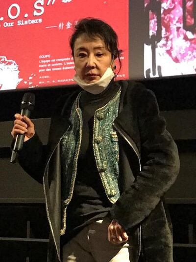 Yan Geling, lead producer and writer of Hu Xueyang's new film, "SOS (Save our Sisters)," calls the woman in chains an extreme embodiment of the demand for women's rights in China. Credit: RFA