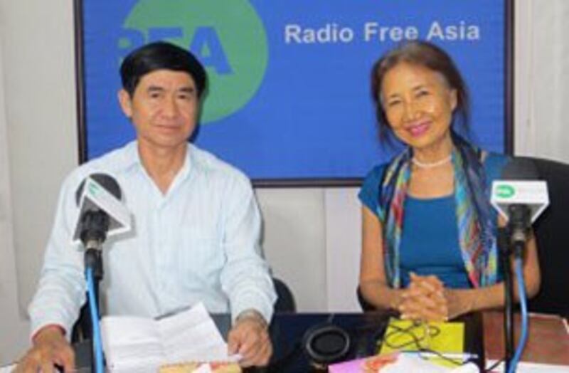 Hang Puthea (L) and Pung Chhiv Kek (R) speak with RFA in a file photo. Credit: RFA