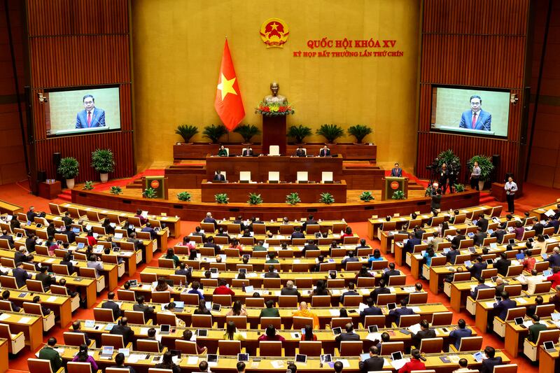 Vietnam's members of parliament attend the National Assembly's extraordinary session opening in Hanoi on February 12, 2025. (Photo by Dang ANH / AFP)