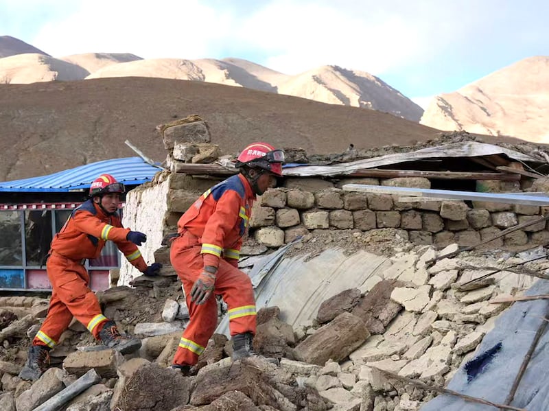 Rescue workers conduct search and rescue for survivors in the aftermath of an earthquake in Changsuo Township of Dingri in Xigaze, southwestern China's Tibet Autonomous Region, Jan. 7, 2025.