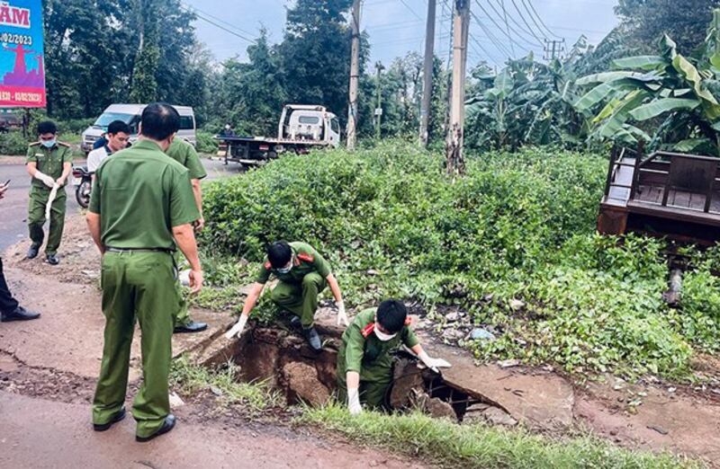 Authorities search the area near a commune office in central Vietnam's Dak Lak province following an attack by an armed group, June 11, 2023. Credit: Facebook/Thong tin Chinh pu