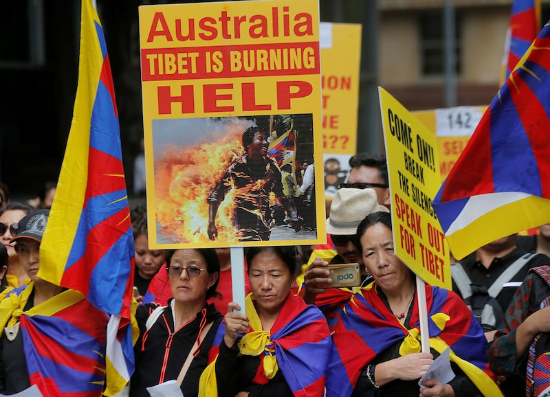 Hundreds of Tibetans march through the center of Sydney, Australia, March 10, 2017,  marking the 58th anniversary of China's presence in Tibet.