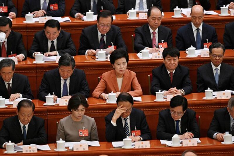 Delegates attend the second plenary session of the 14th National People's Congress at the Great Hall of the People in Beijing, March 8, 2024. (Pedro Pardo/AFP)