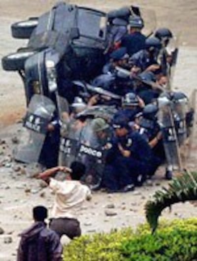 CHINA-WORKER-PROTEST1-150.jpg