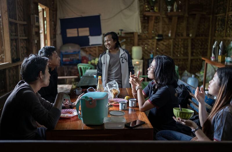 From left, Drs. Aung Ko Myint, Yori, Kaung Hein, Hnin Nu Nu Wai and Tracy have a meal in the O-1 hospital cafeteria in Demoso, Kayah state, Myanmar, Nov. 10, 2024.