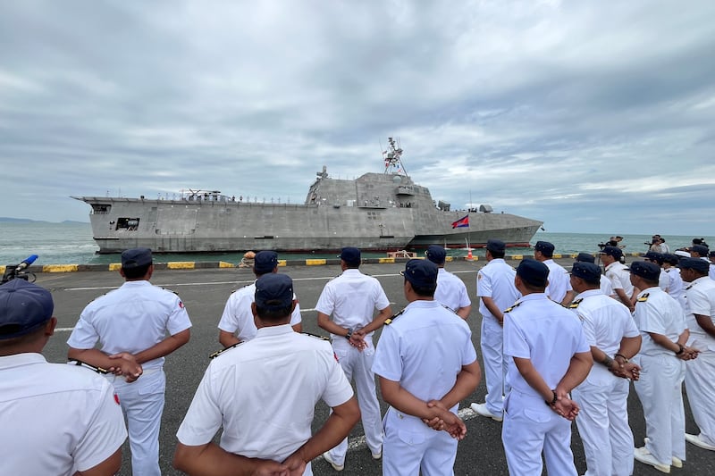 Royal Cambodian Navy personnel line up as the USS Savannah combat ship docks in Cambodia's southern port city of Sihanoukville on December 16, 2024.  (Photo by Suy SE / AFP)