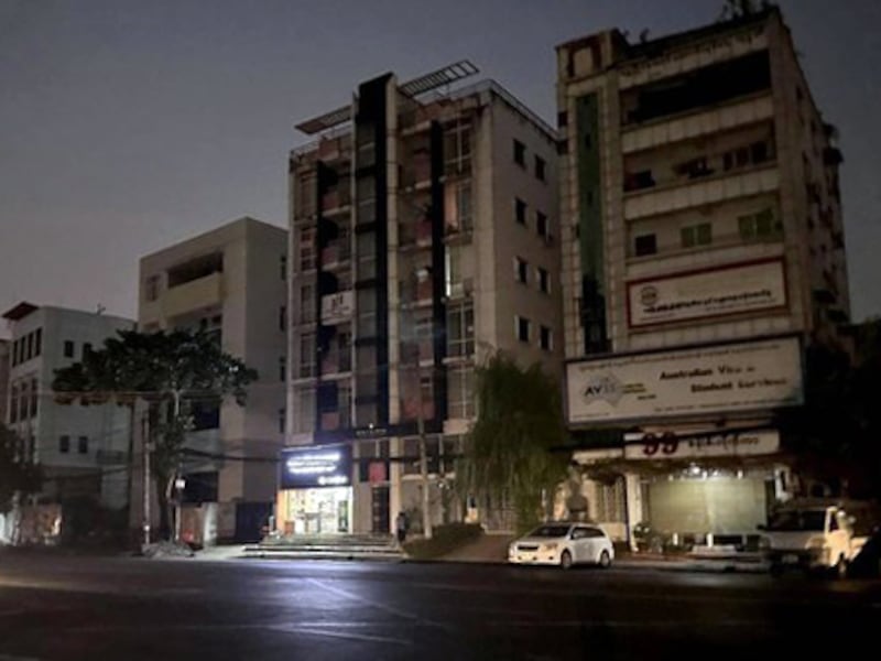 Buildings in darkness on the main road in Yangon, Myanmar, April 28, 2024.