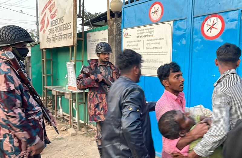 Local people bring a man wounded by a gunshot to Médecins Sans Frontières (Doctors Without Borders) in Ukhia, Bangladesh, Feb. 4, 2024. (Tanbir Miraj/AFP)