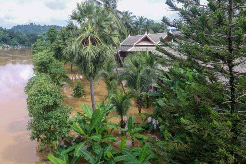 Vegetation and buildings are inundated by floodwaters in Luang Prabang province, Laos, Sept. 12, 2024. (FB/Pouth Freedomman via Reuters)