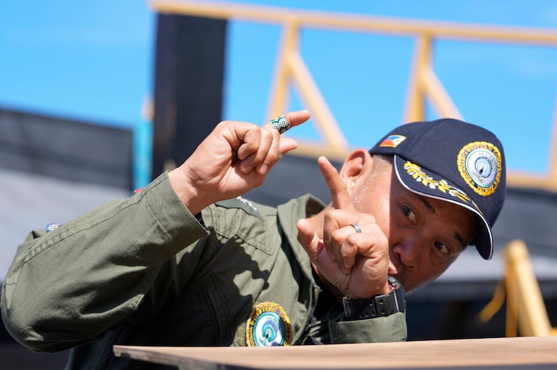 Philippine Western Command chief Vice Adm. Alberto Carlos gestures as he talks to reporters in Palawan province, southern Philippines, about the incident involving a resupply ship in the South China Sea, March 6, 2024. (Aaron Favila/AP)