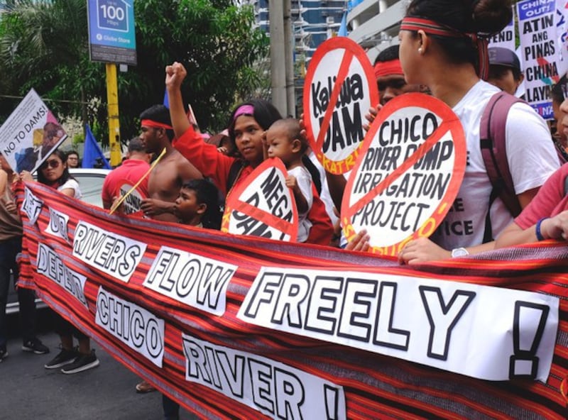 Members of a Philippine tribal community join students during a protest in Manila against a Chinese-backed dam project which, critics say, would destroy the environment in the Sierra Mountain range in Luzon Island, April 9, 2019. Credit: Jason Gutierrez/BenarNews