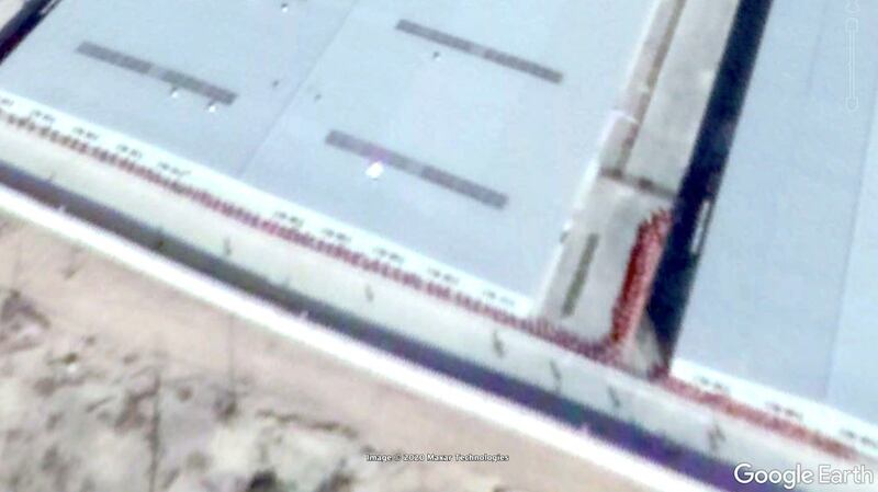 A screen shot of an Oct. 23, 2018 satellite image from Google Earth Pro that purportedly shows one of the internment camps outside of Aksu city with detainees lined up in the yard.