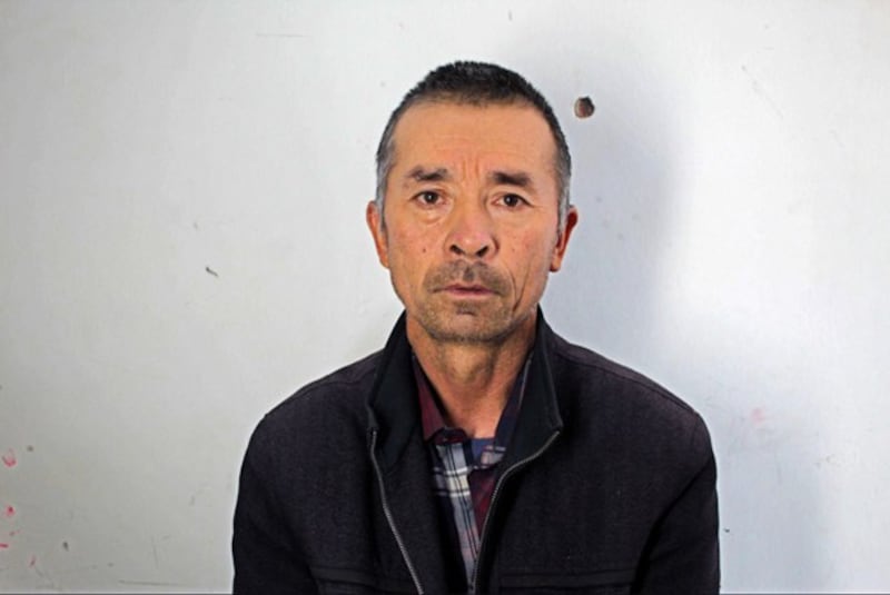 An undated photo of Uyghur detainee Qeyum Abdukerim. Credit: Xinjiang Police Files