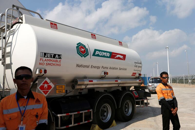 Security guards stand near a tanker carrying aviation fuel during the opening ceremony of Puma Energy fuel storage facility at Myanmar International Terminal Thilawa outside Yangon, Myanmar May 6, 2017. Credit: Reuters