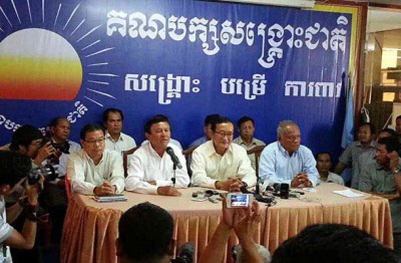 CNRP leaders and representatives speak to reporters in Phnom Penh, June 9, 2014. Photo credit: RFA.