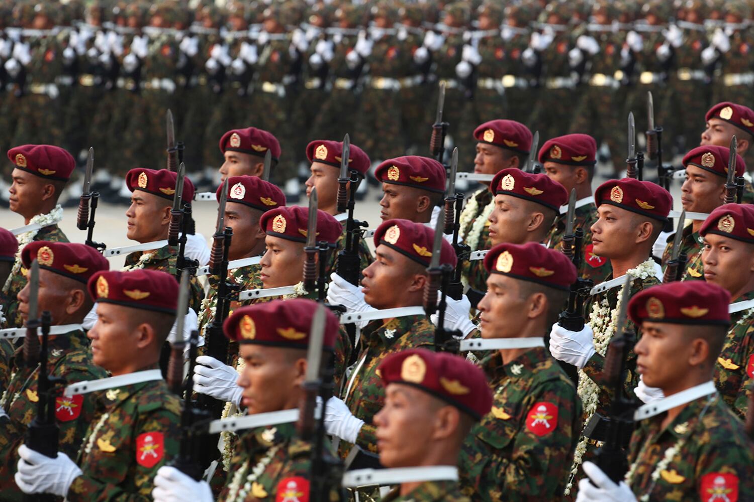 Soldiers march during a parade commemorating Myanmar's Armed Forces Day in Naypyidaw on March 27, 2023.