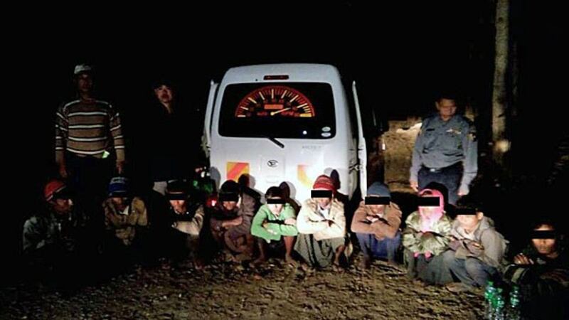 Police arrest 10 Rohingya Muslims from Rakhine state traveling illegally with two human traffickers in the town of Thayetin in Mindon township, central Myanmar's Magway region, Feb. 4, 2019. 