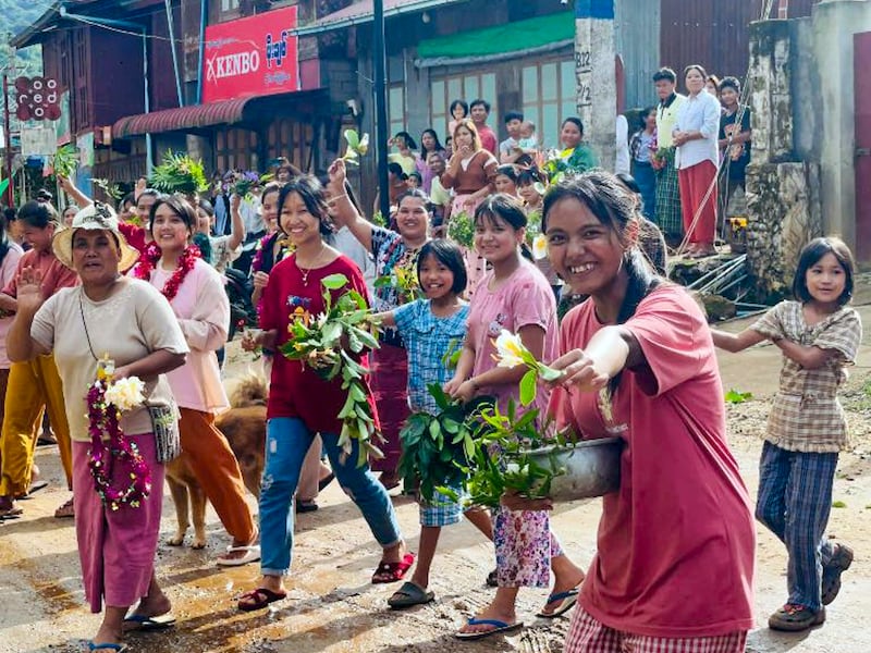 Residents of Mogoke , Mandaly region, Myanmar, greet the Ta’ang National Liberation Army after they took control of the town, July 24, 2024.