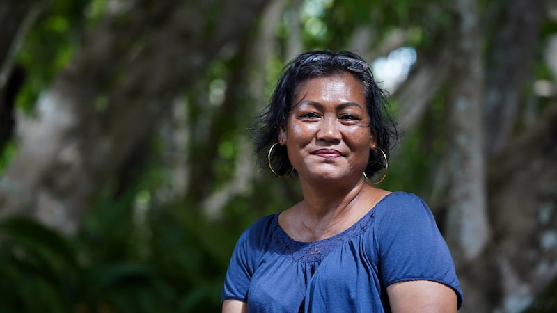 Nest Mechaet, a state legislator for Elab hamlet, sits at her family’s traditional land in Ngaraard state, Palau, Nov. 30, 2024.