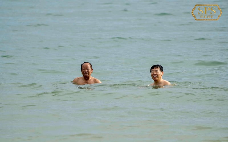 Minister of Defense Tea Banh and Chinese Ambassador Wang Wentian went swimming following Ream Base groundbreaking ceremony in Sihanoukville. Credit: Tea Banh's Facebook page.