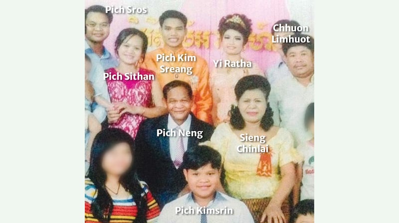 A young Pich Kimsrin poses with well-placed family members in a photo taken at a wedding in 2015. Blurring in photo by RFA.