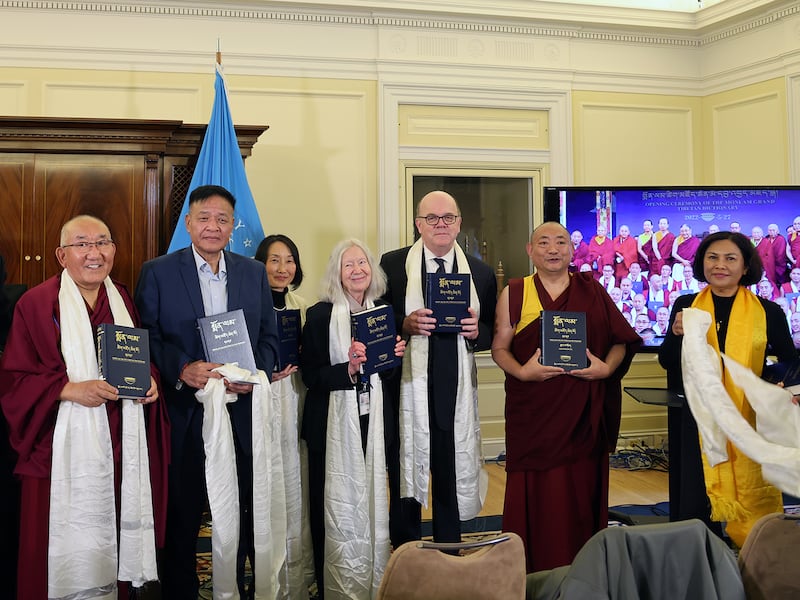 Rep. , D-Mass., center, takes part in the 223-volume Tibetan 'Monlam Dictionary' as it is given to the Library of Congress, Dec. 12, 2024.