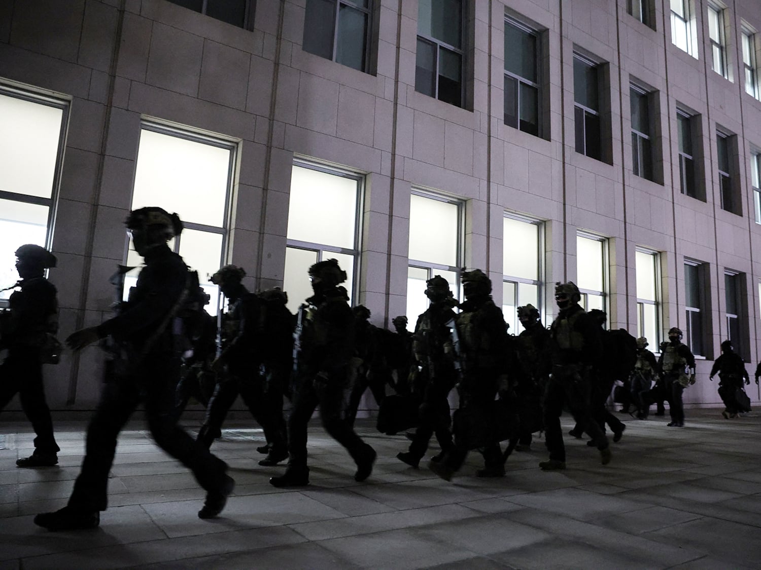 Military forces move outside the National Assembly, after South Korean President Yoon Suk Yeol declared martial law, in Seoul, Dec. 4, 2024.