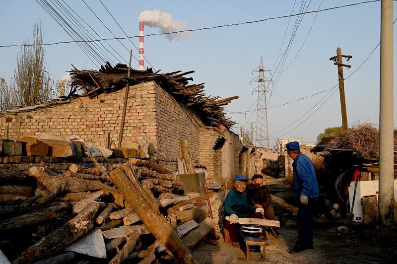 Smoke belches from a coal-powered power station near Datong, China's northern Shanxi province, Nov. 2, 2021.